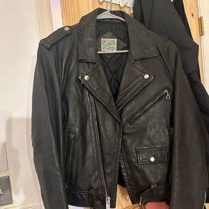genuine leather jacket. no tears. no holes. no scratches. in great condition.